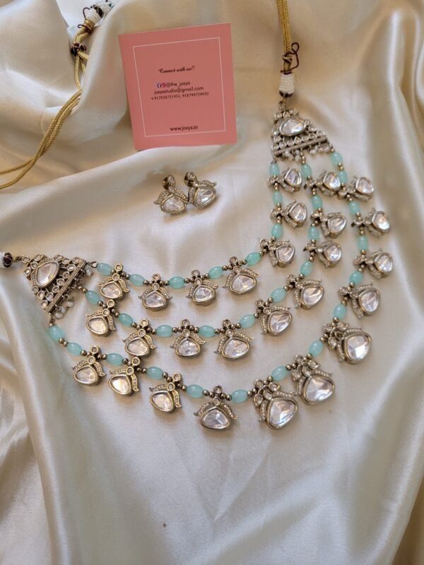 Ojasvi Polki Light Green Necklace Set