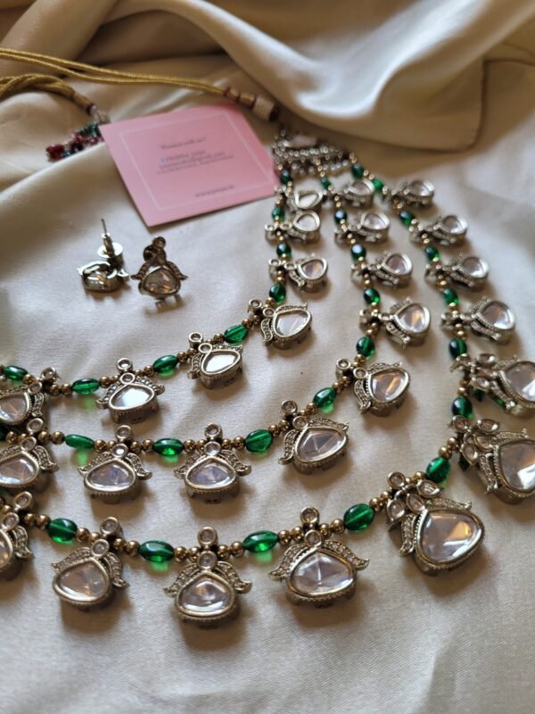 Ojasvi Polki Emerald Necklace Set